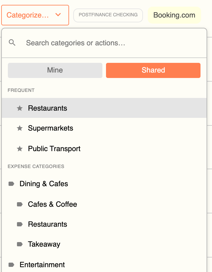 The Categorize popover on a Booking.com charge, with the Mine/Shared toggle switched to Shared and a list of expense categories below it.